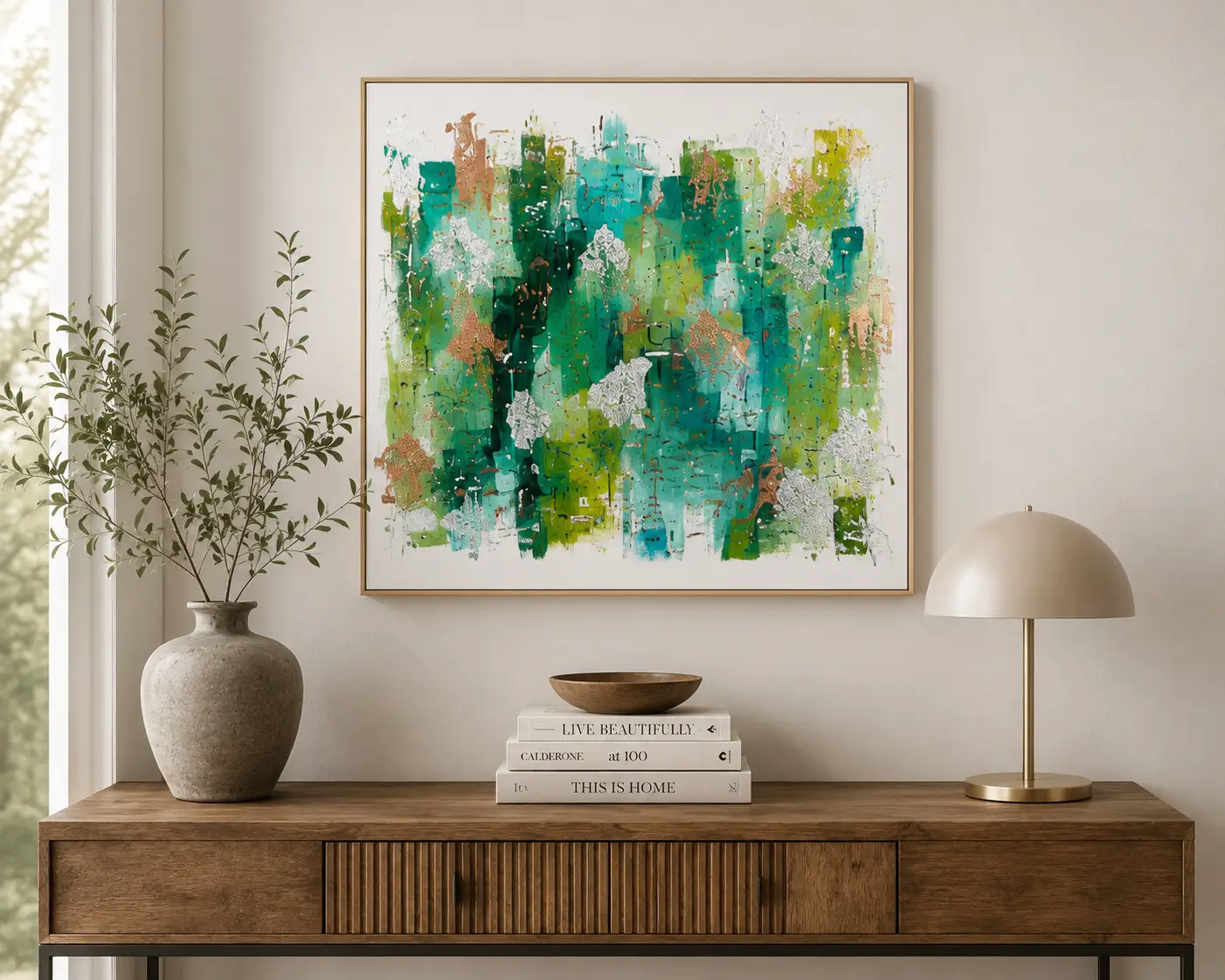 Green and teal abstract painting by Alice Chambers above a sideboard in a living room