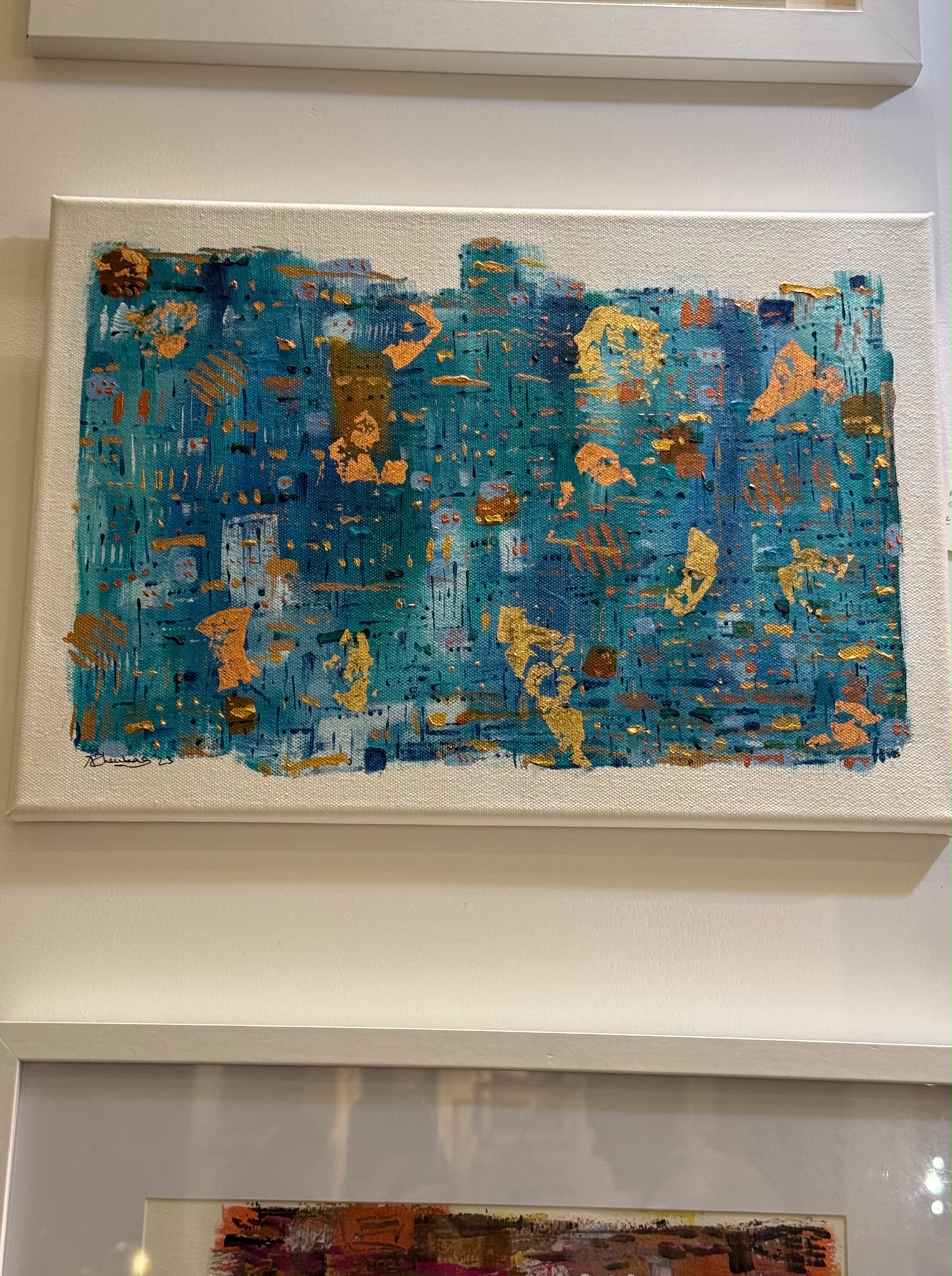 Alice Chambers original teal blue and gold abstract acrylic painting on display at exhibition