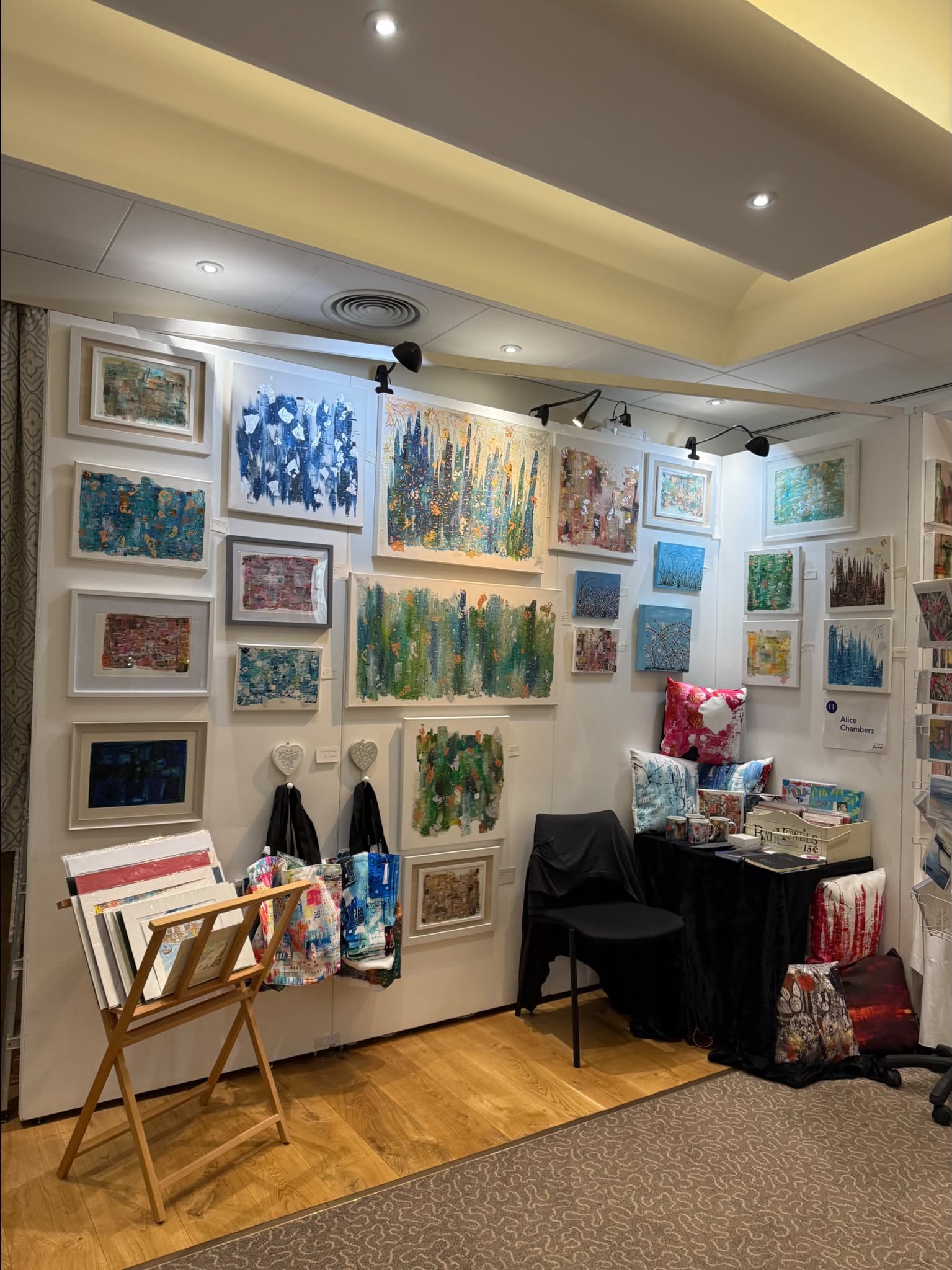 Alice Chambers abstract art exhibition display with paintings covering a full gallery wall